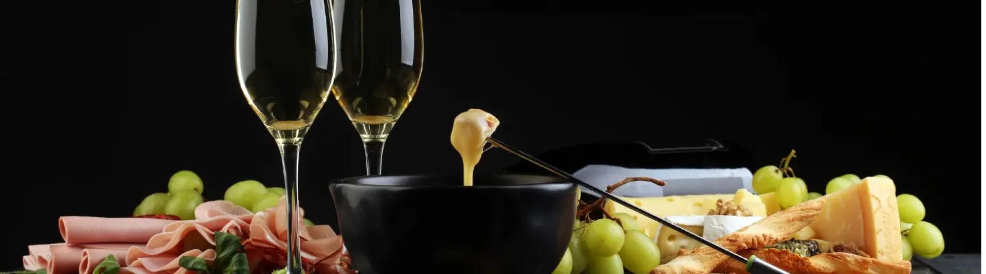 LA02_gourmet-swiss-fondue-dinner-with-assorted-cheeses-picture-id639351724